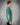 Side view of Bregos Brando green men's sweatshirt – Retro print in soft cotton